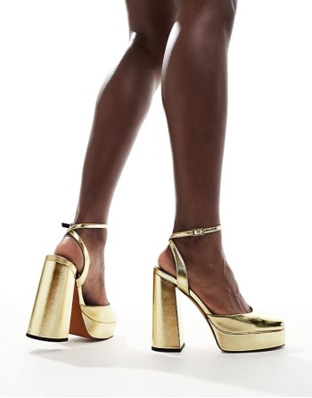 Pressure platform high heeled shoes in gold