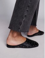 Camille studded flat mules in black